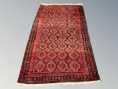 An Afghan Balouch rug 110 cm x 180 cm