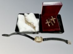 Three 9ct gold crucifixes,