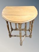 An oak drop leaf gateleg table,