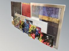 Eleven contemporary unframed contemporary oils on canvas,