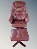 A Danish brown stitched leather swivel armchair on stained beech pedestal with matching footstool