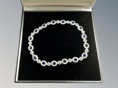 A Ciner of New York costume necklace inset with blue and white stones