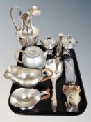 A silver plated ewer together with a similar pair of miniature samovars,