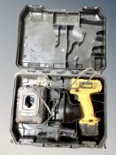 A Dewalt drill in box