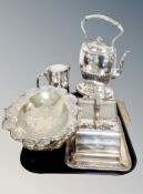 A group of silver plated items, spirit kettle on stand, teapot, cheese dish and cover,