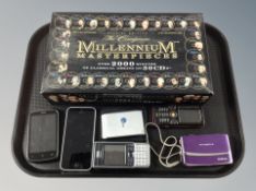 A Millenium Masterpieces classical music CD box set and a quantity of mobile phones