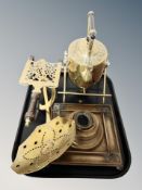 A brass spirit kettle on stand, further trivet,