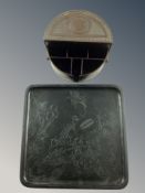 A 1920's Bakelite change tray etched with a Geisha playing an instrument together with an Art Deco