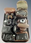 A group of cameras including Praktica Super TL, Retinette, Cannon Mega zoom 105,