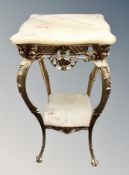 A gilt and onyx two tier occasional table,