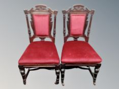 A pair of late Victorian salon chairs in red dralon upholstery
