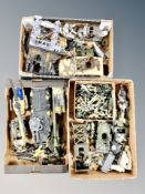 Three boxes of die cast plastic military vehicles and soldiers