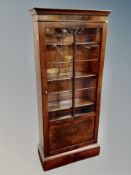 A Danish mahogany glazed single door bookcase,