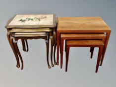 A Danish teak nest of three tables and a further tiled nest of tables