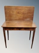 A 20th century Danish teak and figured walnut turn over top tea table,