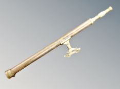A lacquered brass telescope,