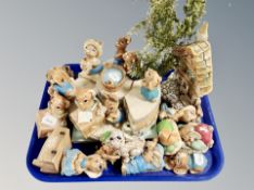 Two Pendelfin display stands and a quantity of rabbits