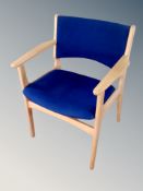 A Danish beech framed armchair in blue upholstery