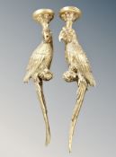 A pair of gilt wall sconces in the form of parrots,