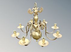 A brass eight branch chandelier