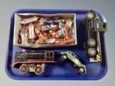 An electric tin plate railway locomotive, wind-up die cast car,