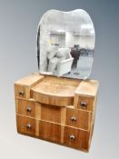 A burr walnut mirror backed sunk centred dressing table,