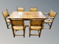A good quality Lees style heavily carved oak extending refectory dining table,