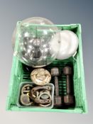 A crate of antique dumbbells, metal detector finds,