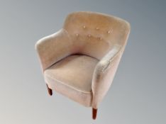 An early 20th century Dralon upholstered armchair