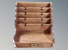 A teak correspondence rack