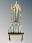 A Gothic style oak high backed chair