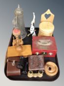 A tray of brass desk flag pole, enamelled cash tin, desk blotter, two pairs of opera glasses,