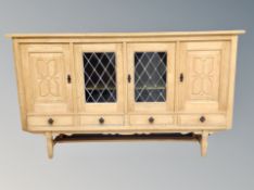 A Danish blond oak four door sideboard,
