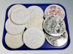 A tray of Danish glazed earthenware wall plates,