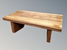 A mango wood low rectangular coffee table,
