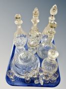 A tray of 20th century crystal decanters with stoppers, lidded dish,
