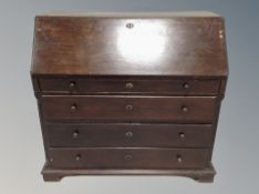 A 19th century oak fall front bureau,