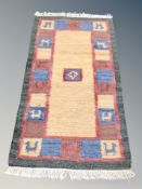 An Eastern flat weave rug 143 cm x 74 cm