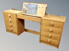 A contemporary pine dressing table with lift up top,
