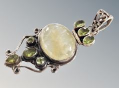 A large silver pendant