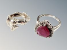 Two silver rings set stones