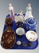 A Chinese porcelain blue and white ginger jar decorated with Prunus together with two pieces of