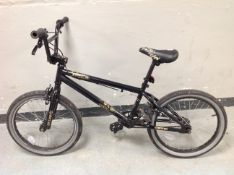 A boys Spine X-Rated BMX bike