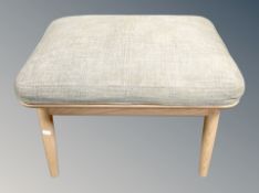 An Ercol elm footstool