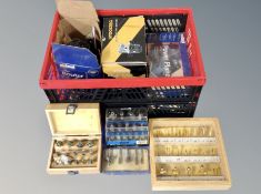 A crate of tools, router,