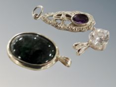 Three silver pendants
