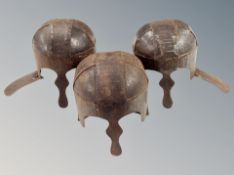Three Viking style steel helmets