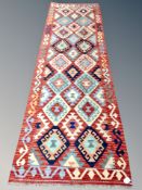A Chobi kilim runner 295 cm x 82 cm