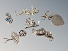 Four charms and two pendants