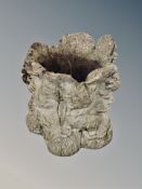 A naturalistic concrete garden planter height 37 cm